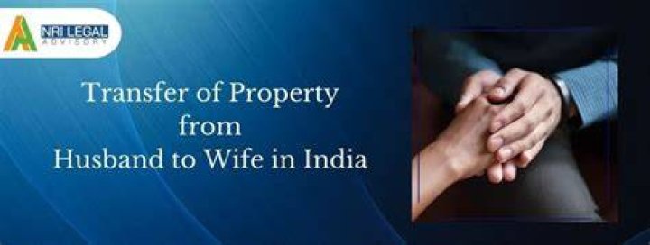 How do I transfer land from husband to wife?