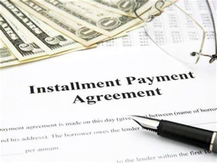 What happens if you pay your taxes late and get an installment agreement?